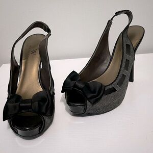 Worthington gray and black peep toe heels with black bows.
